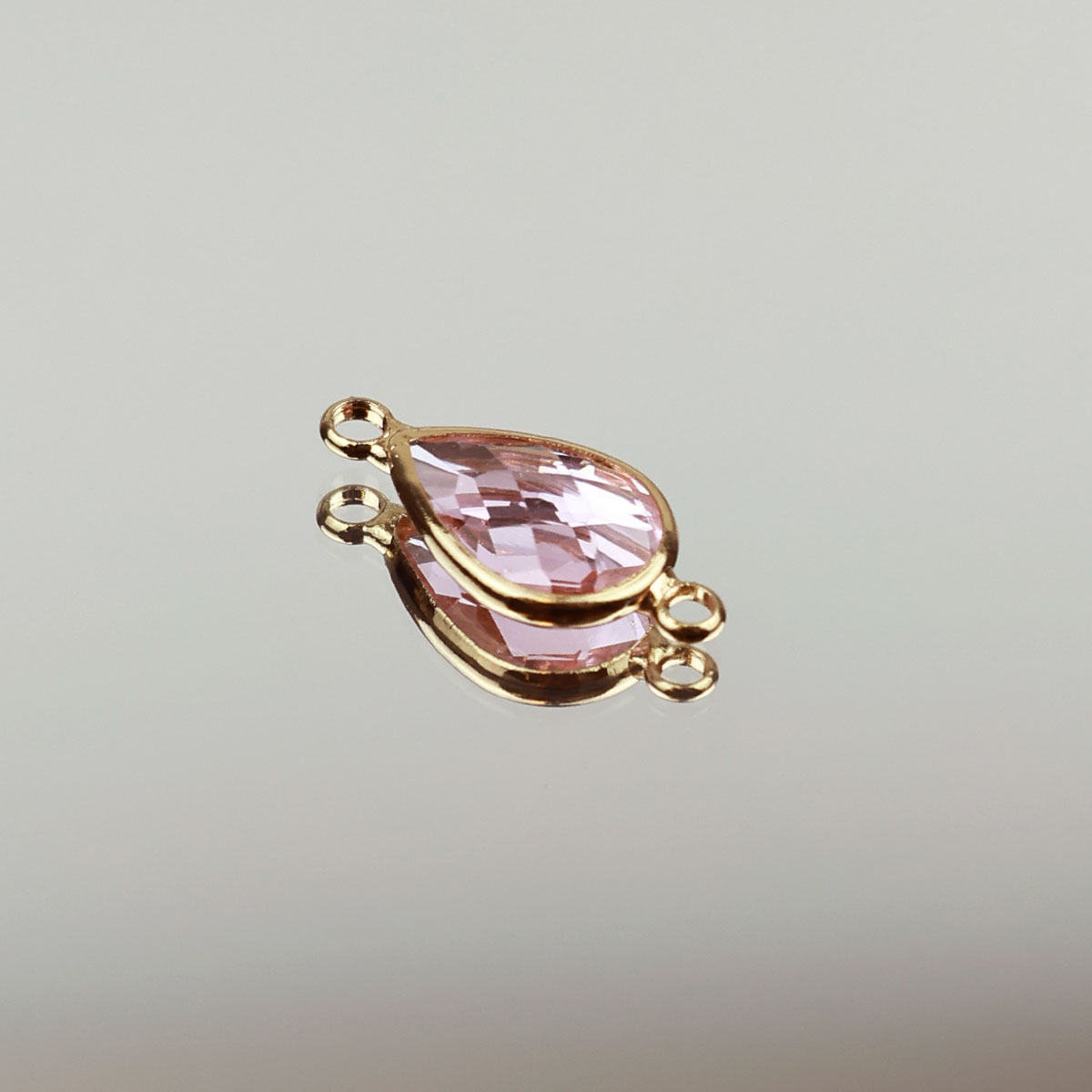 Подвеска (соединитель для бижутерии) (уп. 10шт) капля прозрачная 10*14 мм 009 розовый