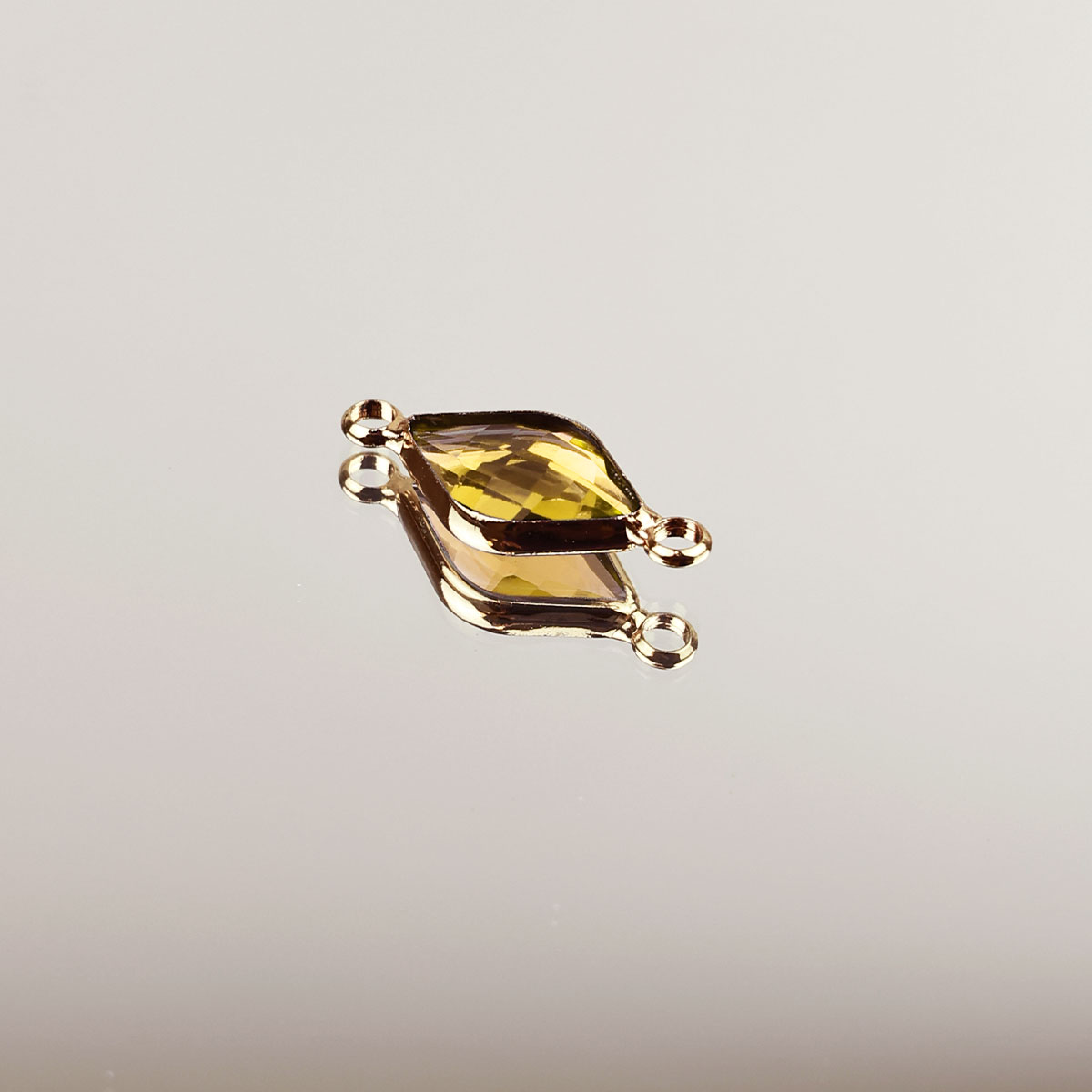 Подвеска (соединитель для бижутерии) (уп. 10шт) ромб прозрачный 10*14 мм 018 желтый