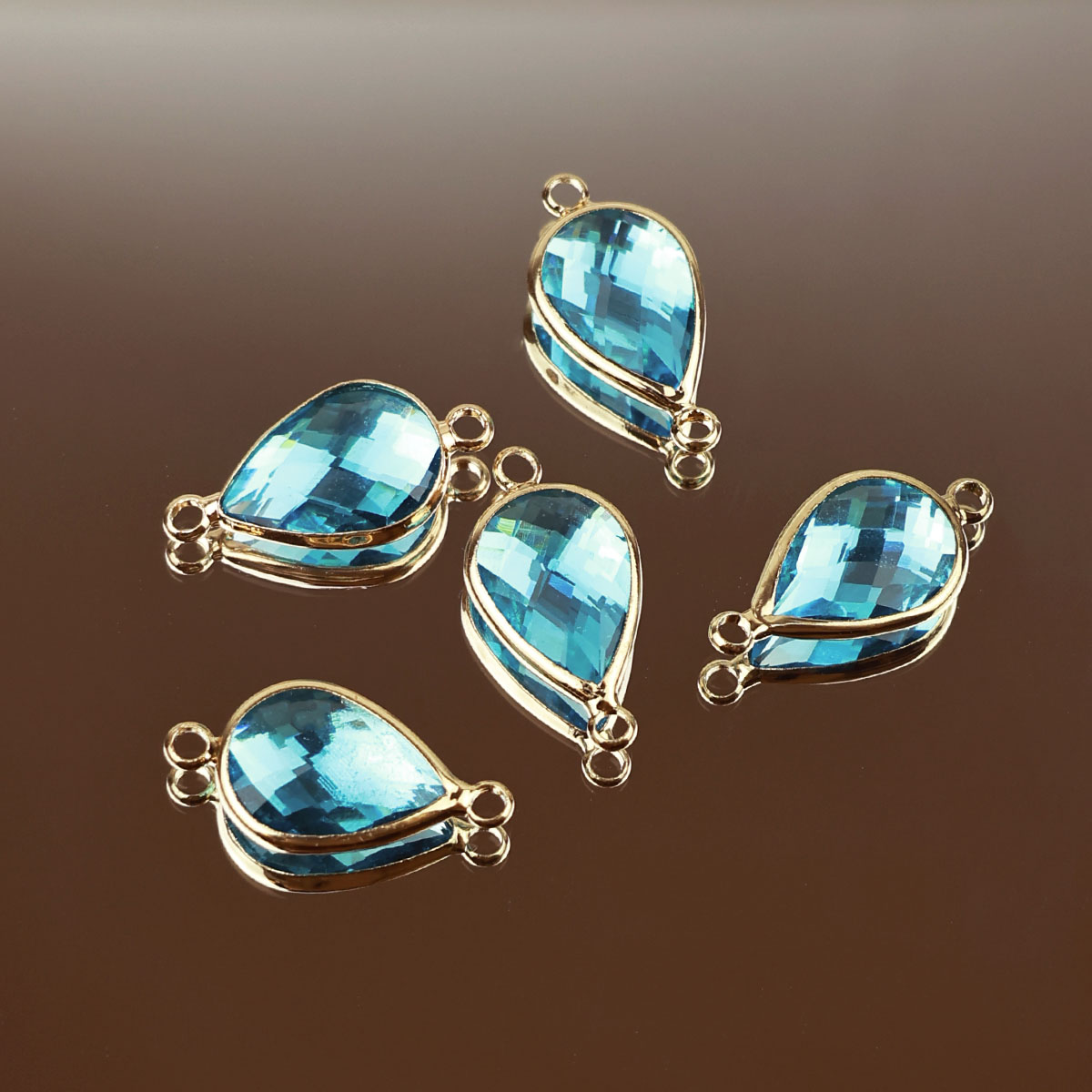 Подвеска (соединитель для бижутерии) (уп. 10шт) капля прозрачная 10*14 мм бирюза